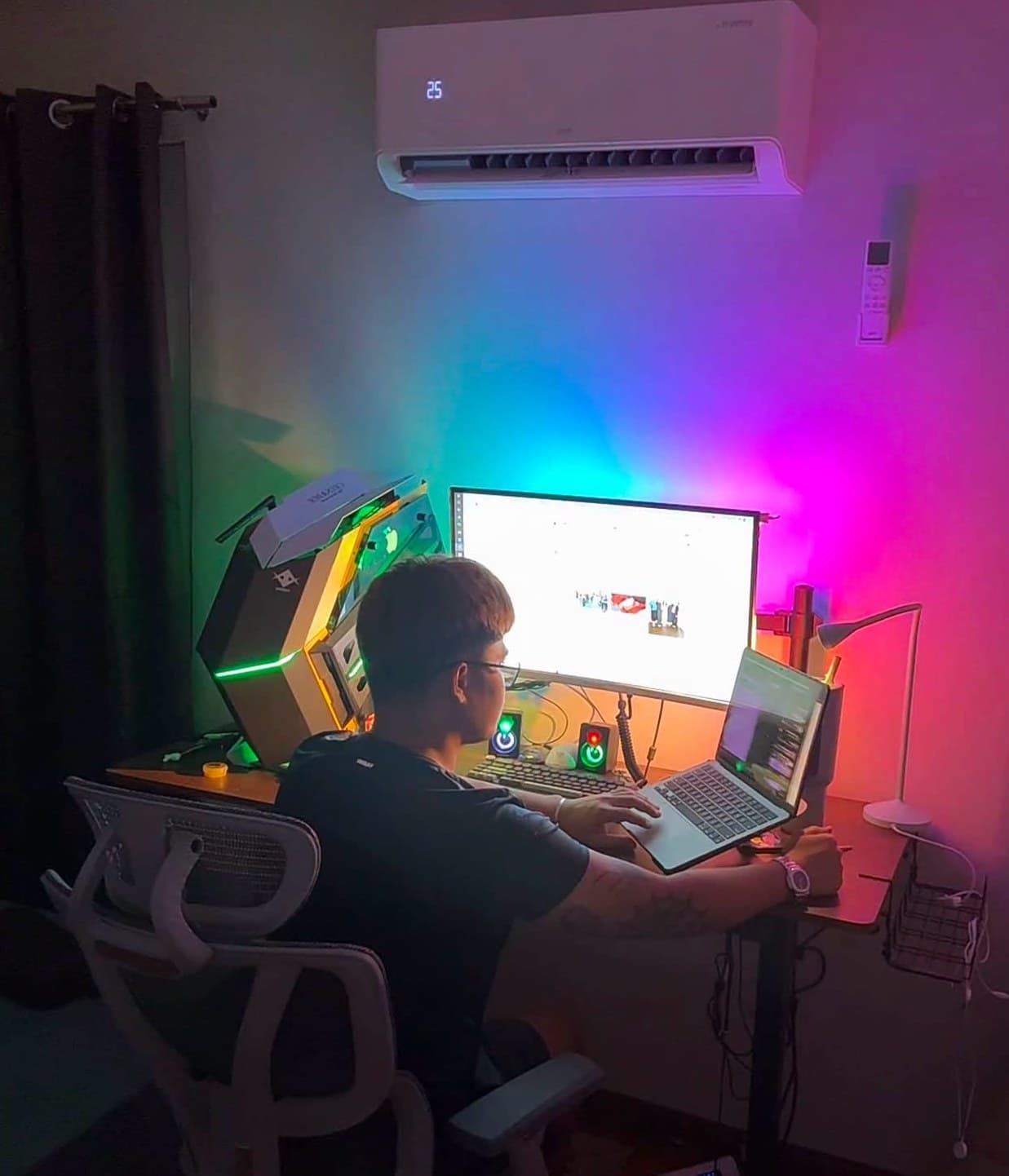 Christopher Cruz at his workstation